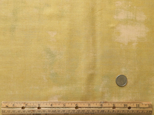 multicolored gold and green cotton fabric