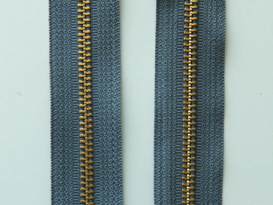 dark gray and gold zipper