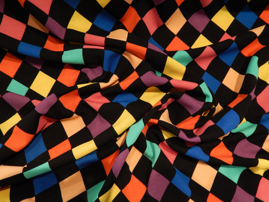 blue, red, purple, and yellow checkered knit sports fabric