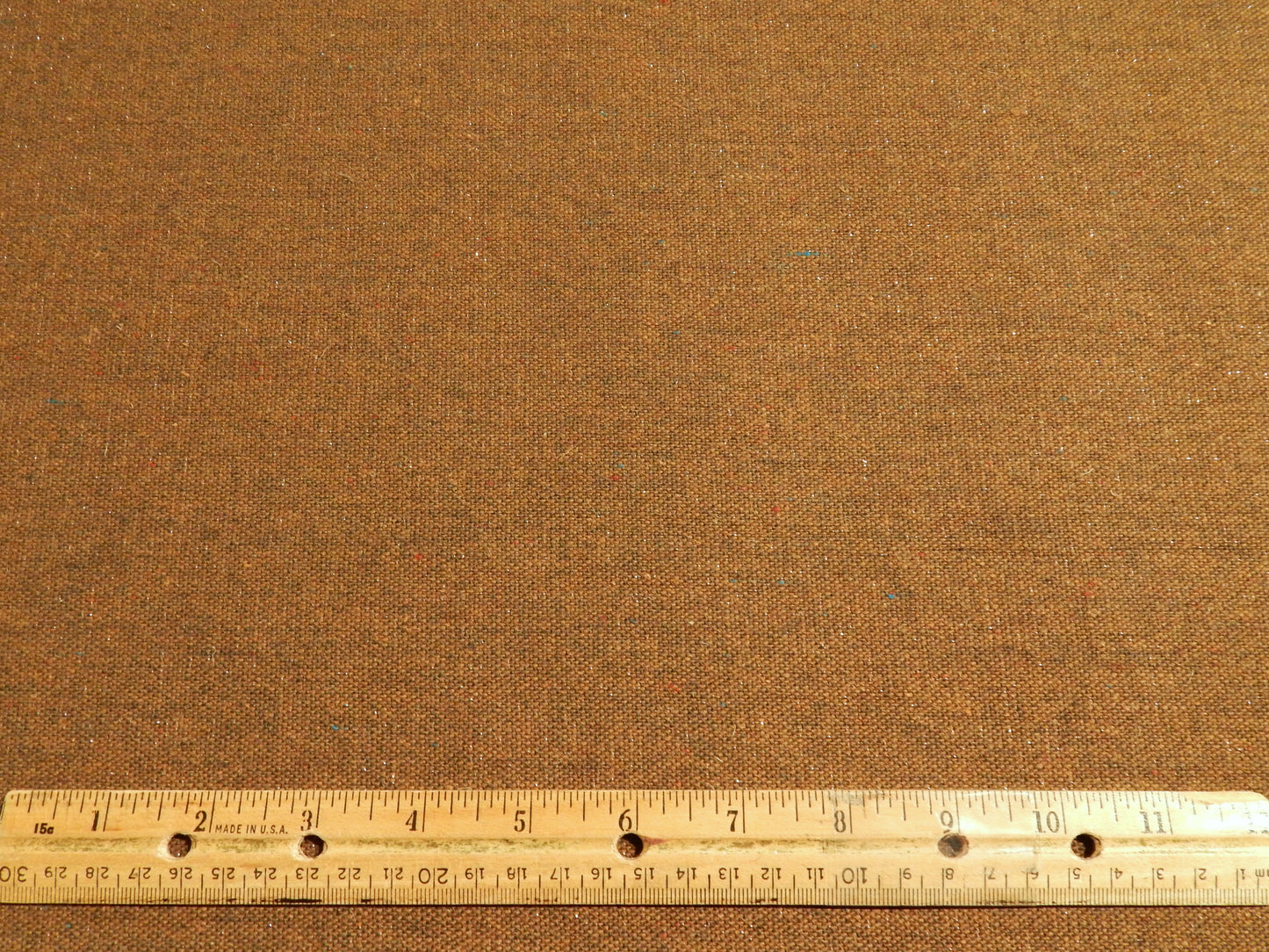 sparkly brown wool fabric with green red and blue