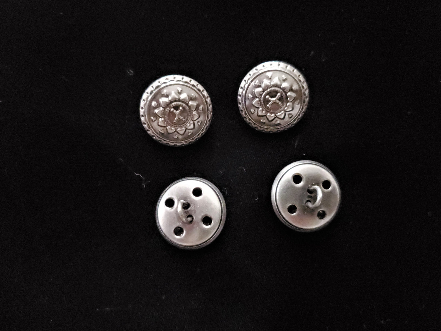 embossed metal button