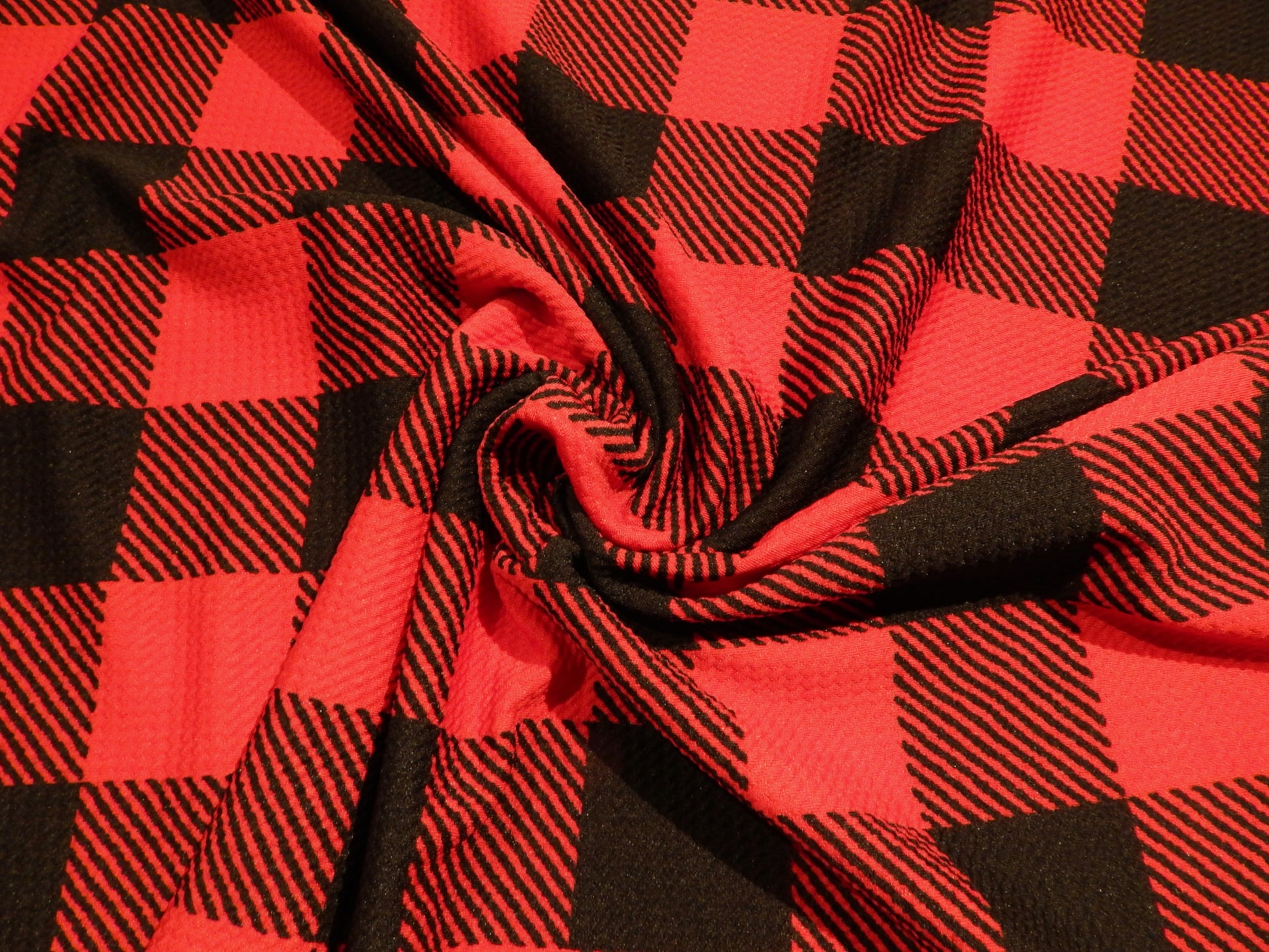 red and plaid buffalo plaid bullet knit fabric