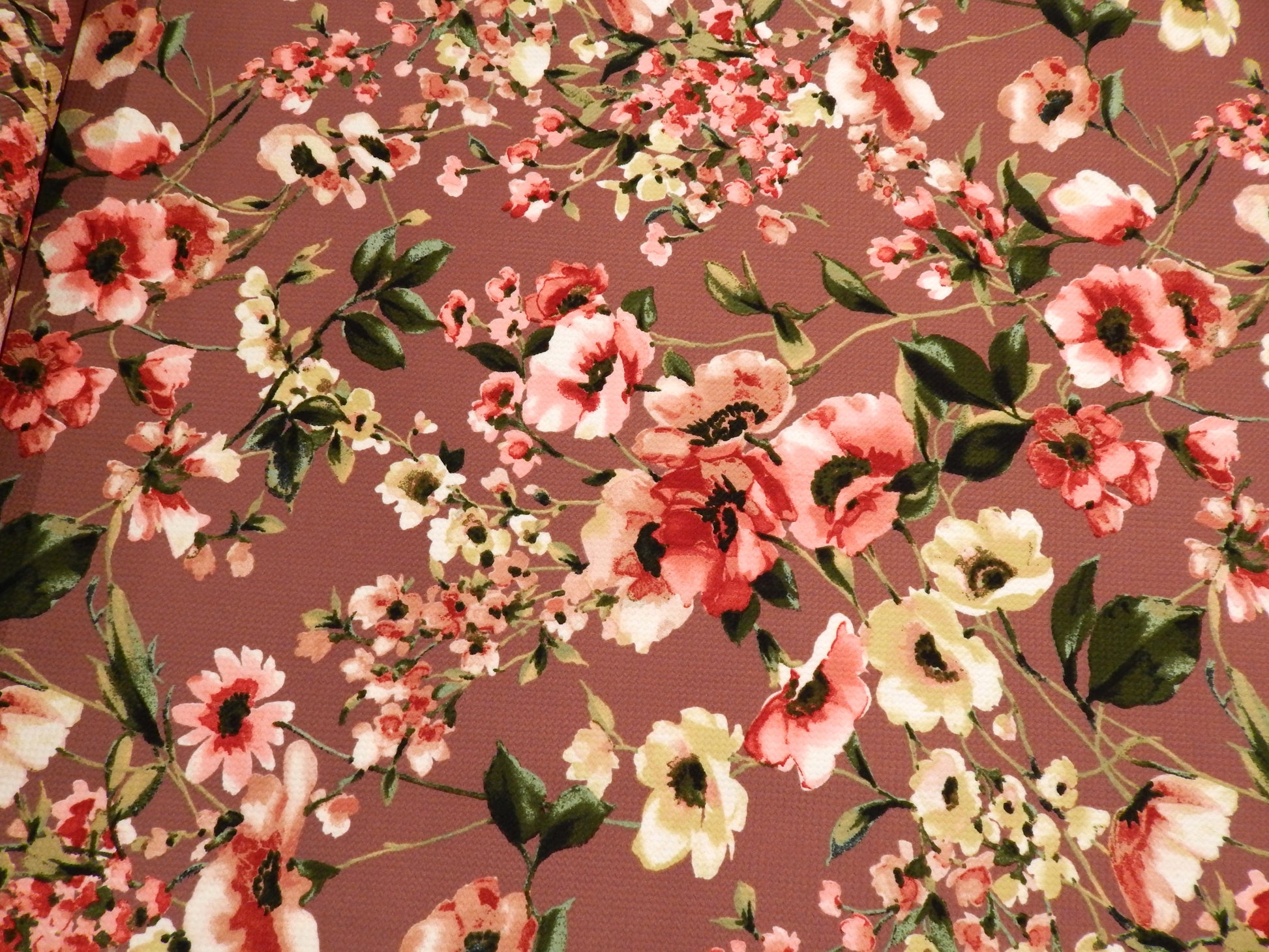 mauve floral deadstock bullet knit fabric