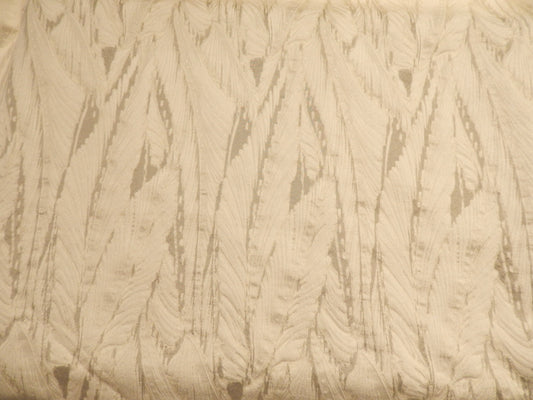 seraphim ivory brocade deadstock fabric on a black background