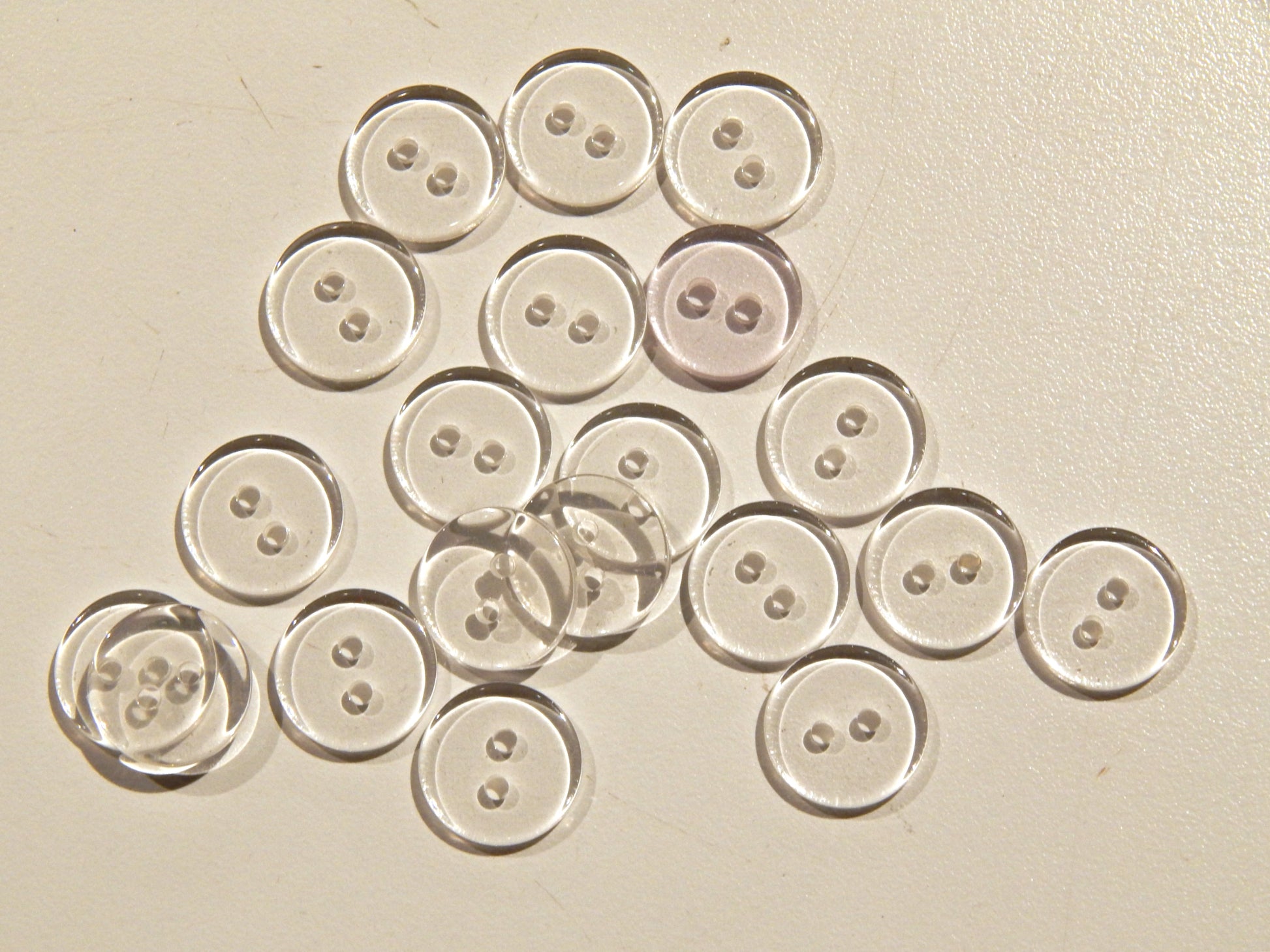 clear 1/2" plastic buttons