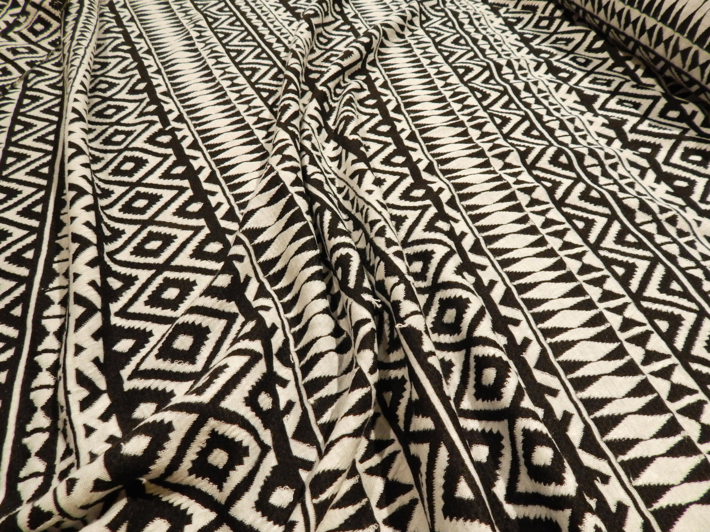 black and white Aztec geometric print deadstock knit fabric