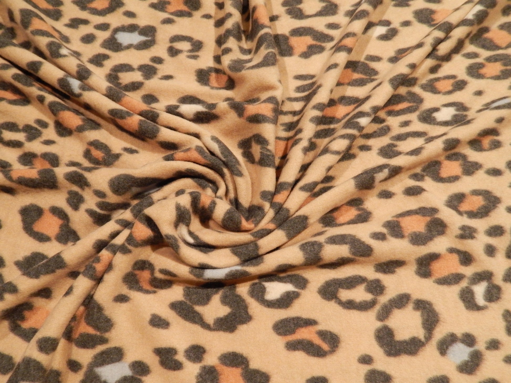 cheetah print brushed deadstock sweater knit fabric