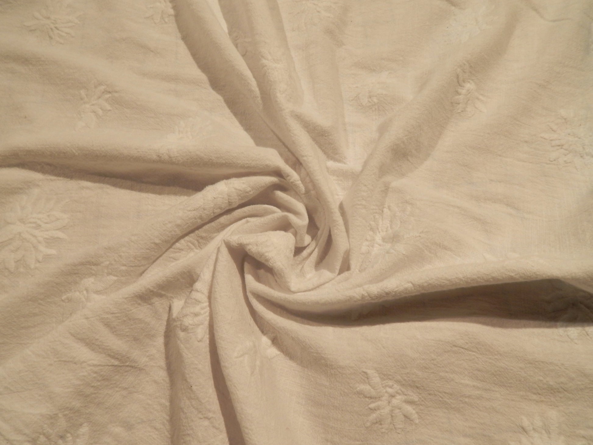 white on white linen cotton blend embroidered floral eyelet deadstock fabric