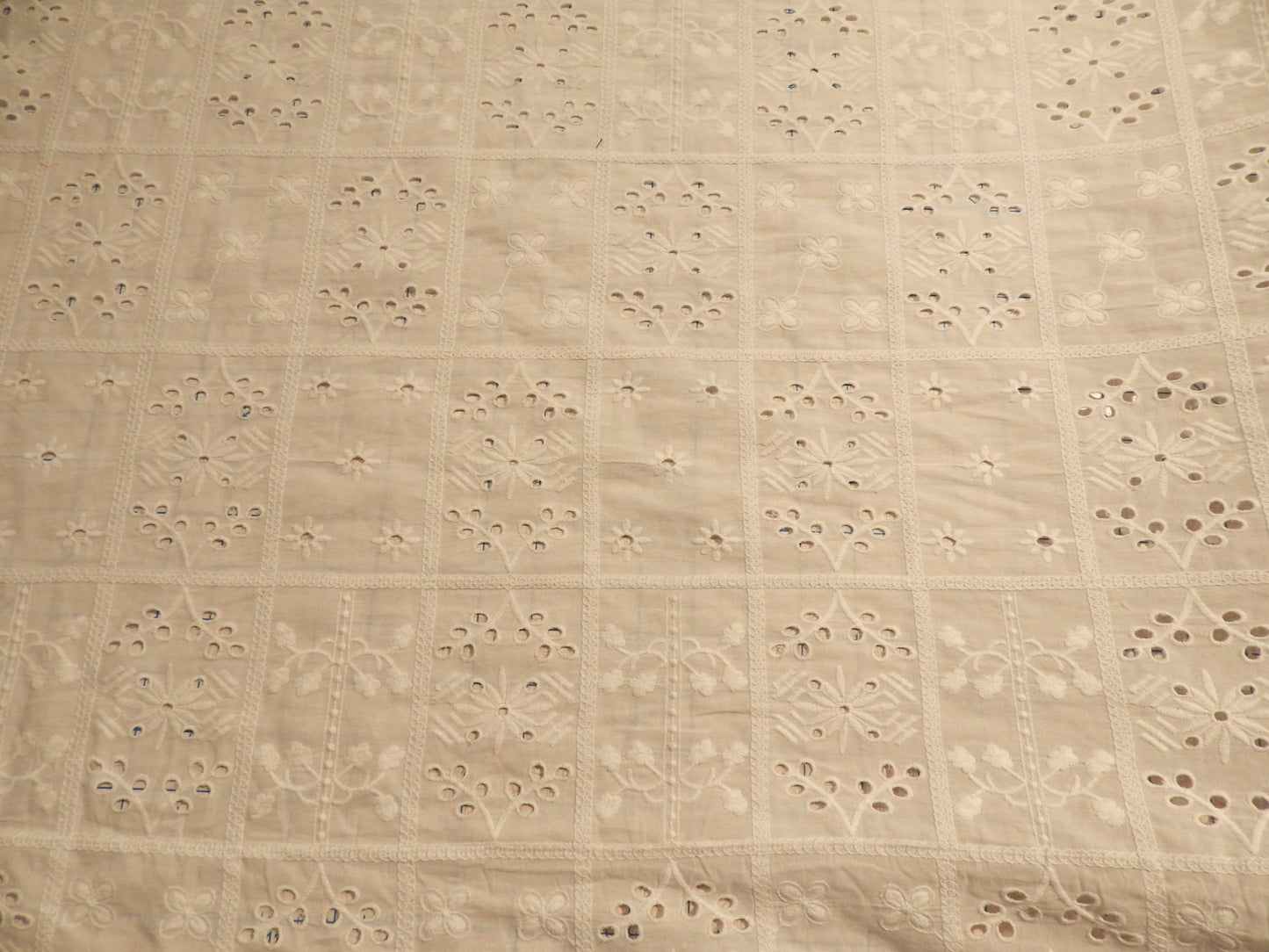 white cotton eyelet telio flower patch tile style embroidery fabric