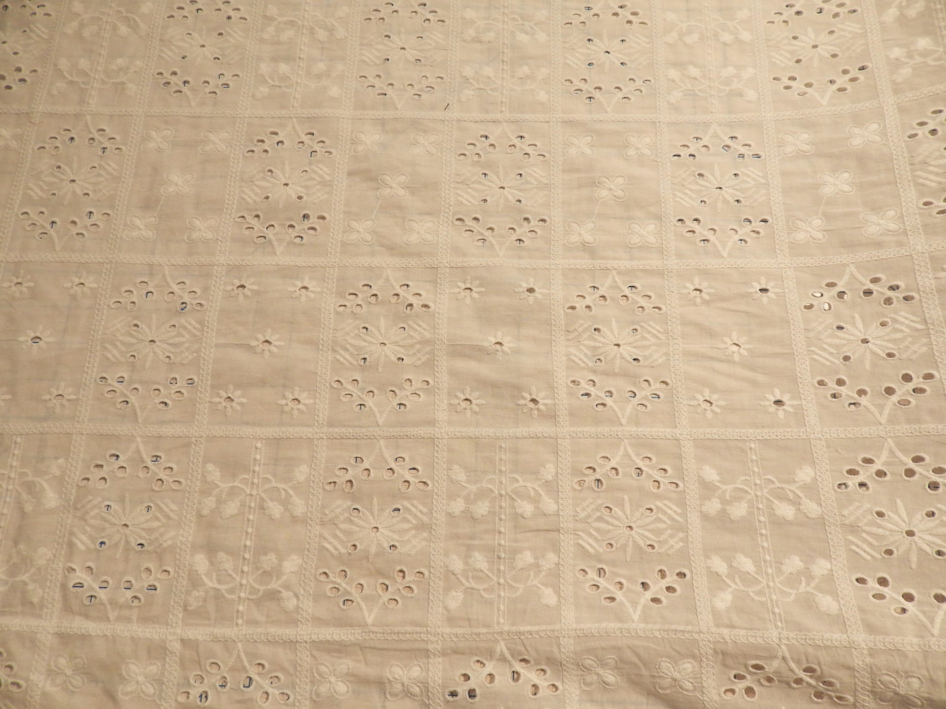 white cotton eyelet telio flower patch tile style embroidery fabric