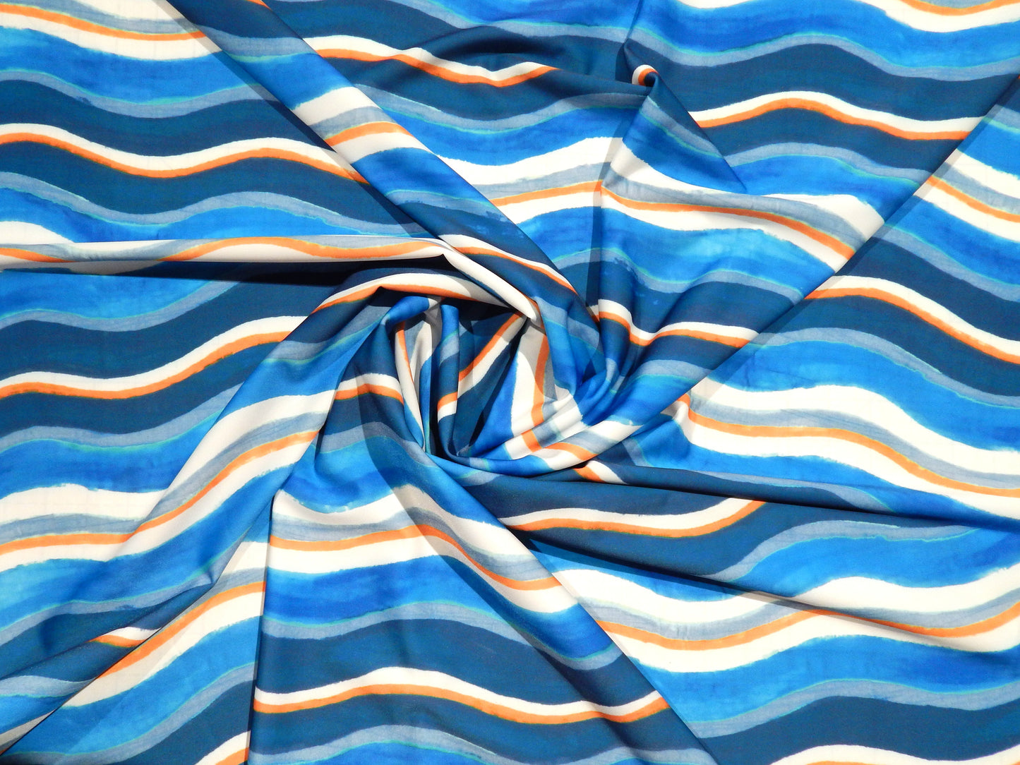 orange blue and white wavey striped stretch swim knit fabric nylon spandex telio