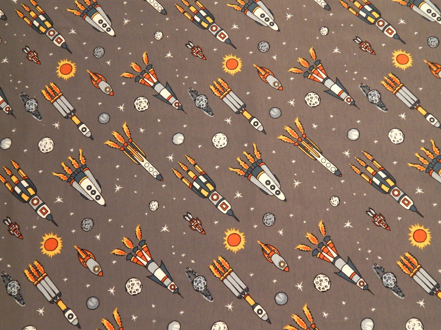 boys spaceship rocket asteroid sun space themed cotton jersey knit fabric