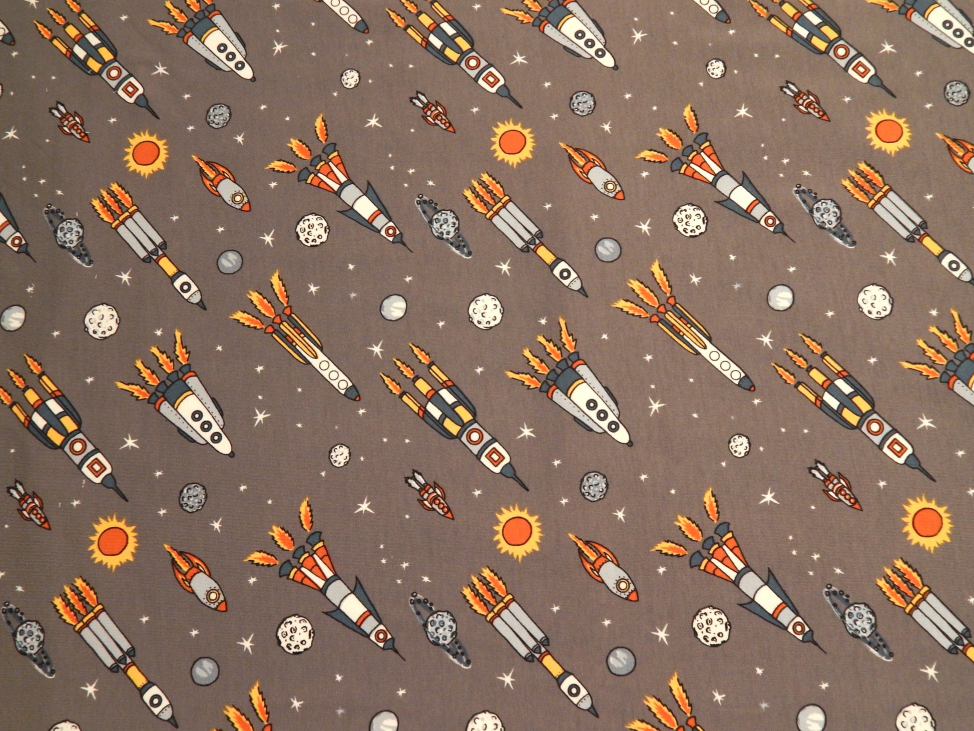 boys spaceship rocket asteroid sun space themed cotton jersey knit fabric