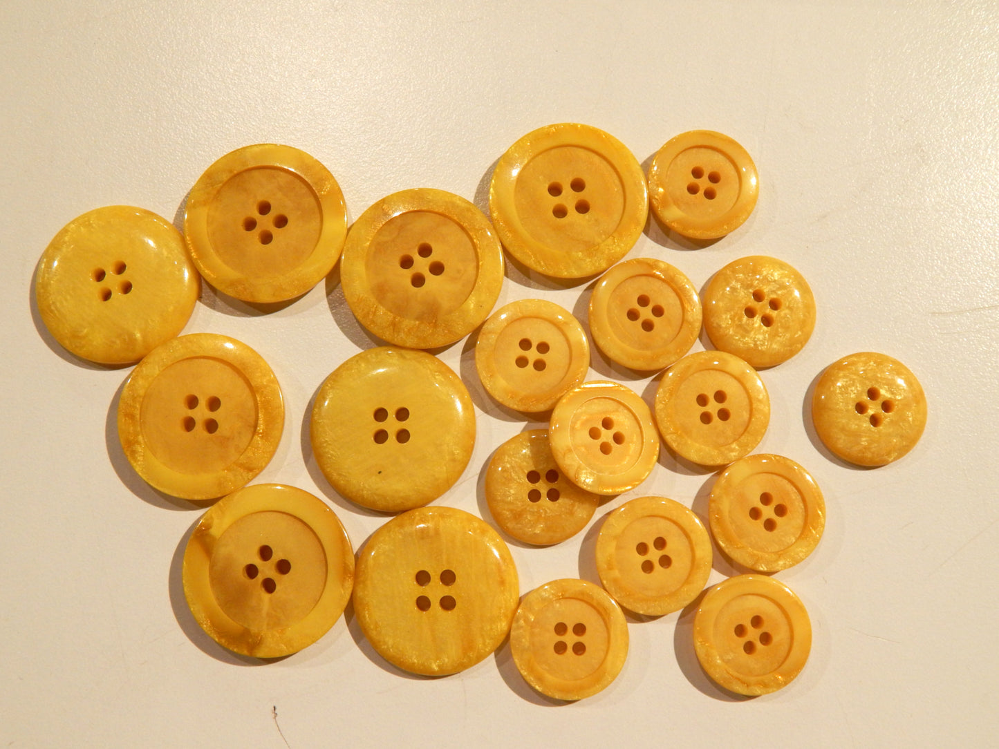 italian yellow marbled resin buttons in multiple sizes