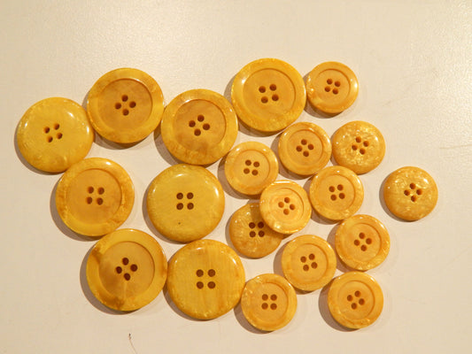 italian yellow marbled resin buttons in multiple sizes