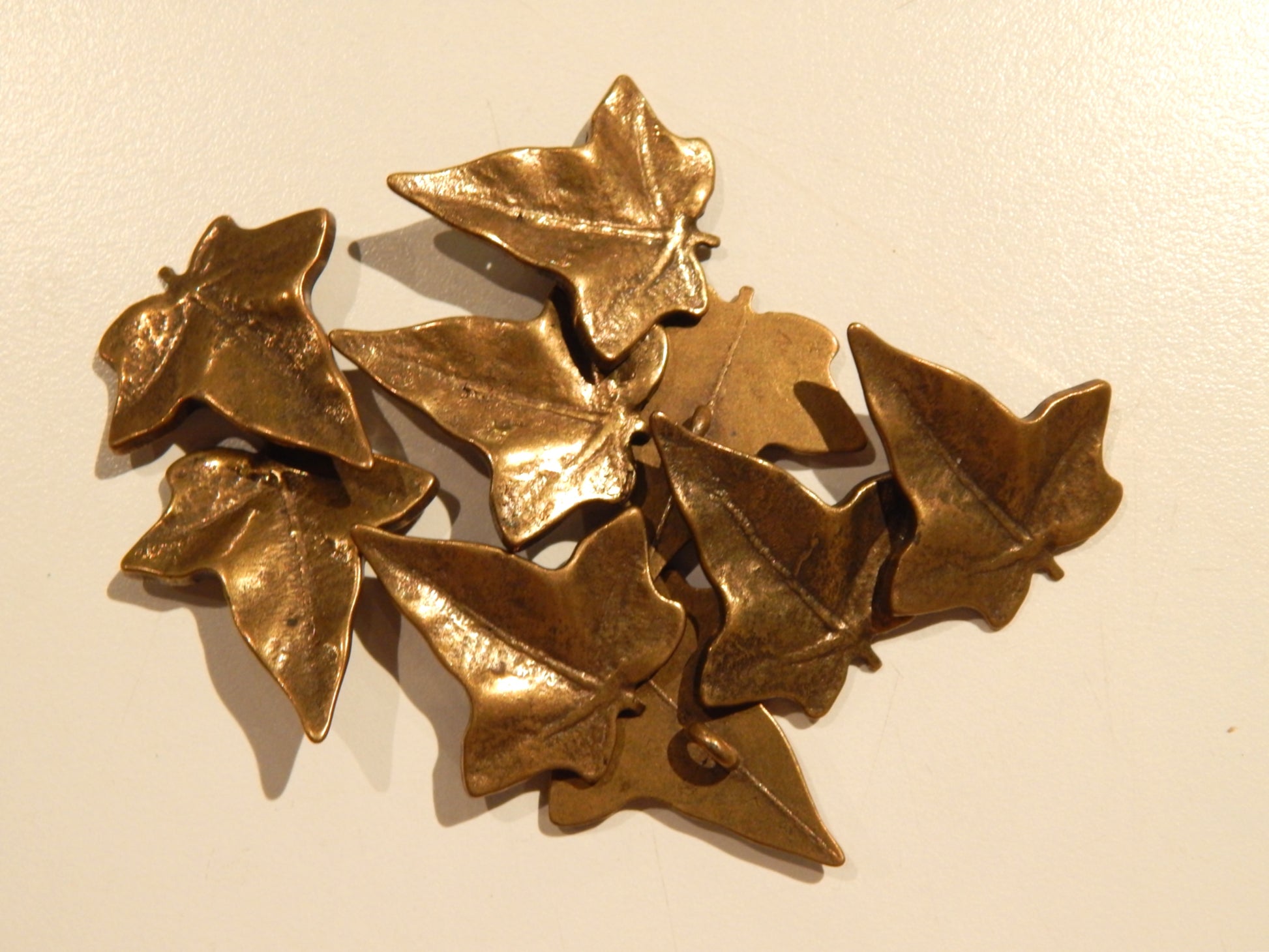 elvish lord of the rings fellowship of the ring leaf of lorien canadian leaf shaped brass button