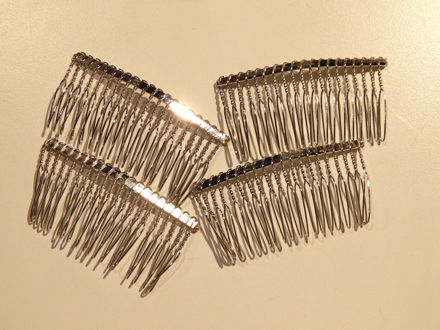 silver metal bridal veiling combs