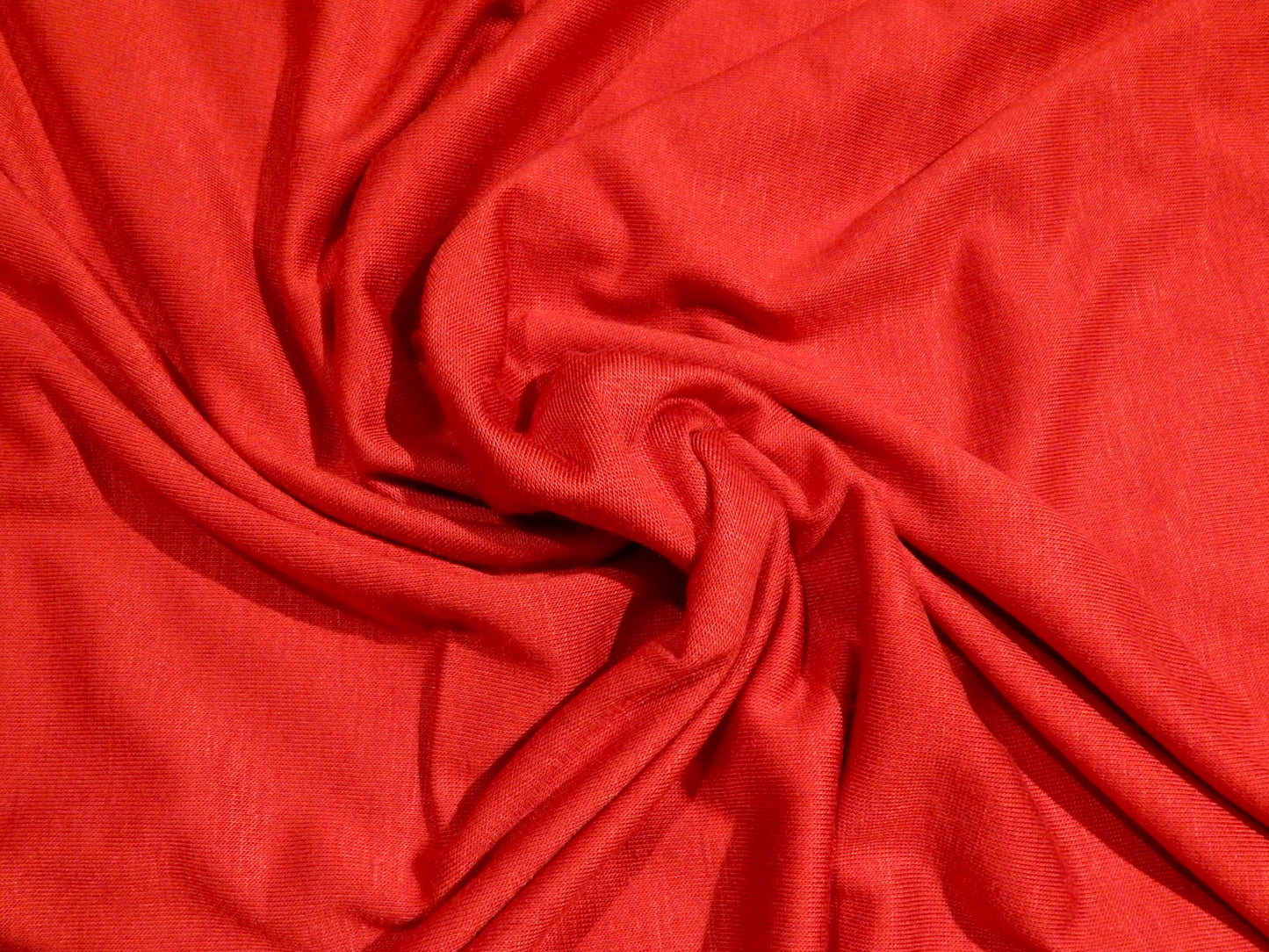 bright red rayon jersey knit deadstock fabric chiefs red fabric