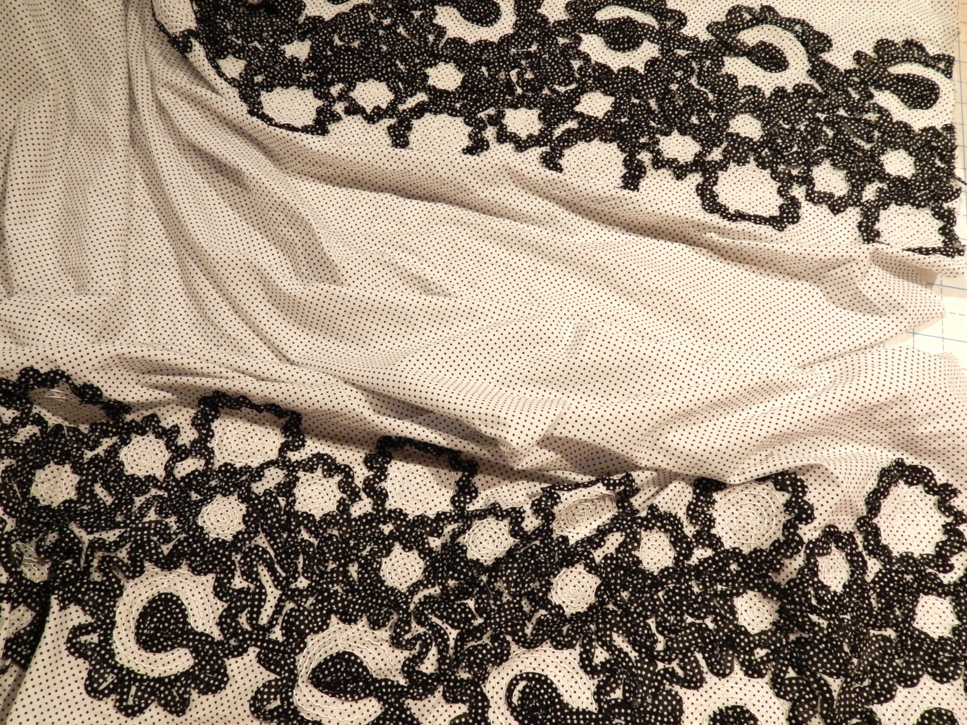 black and white polka dot couched double border squiggle corded cotton shirting deadstock fabric