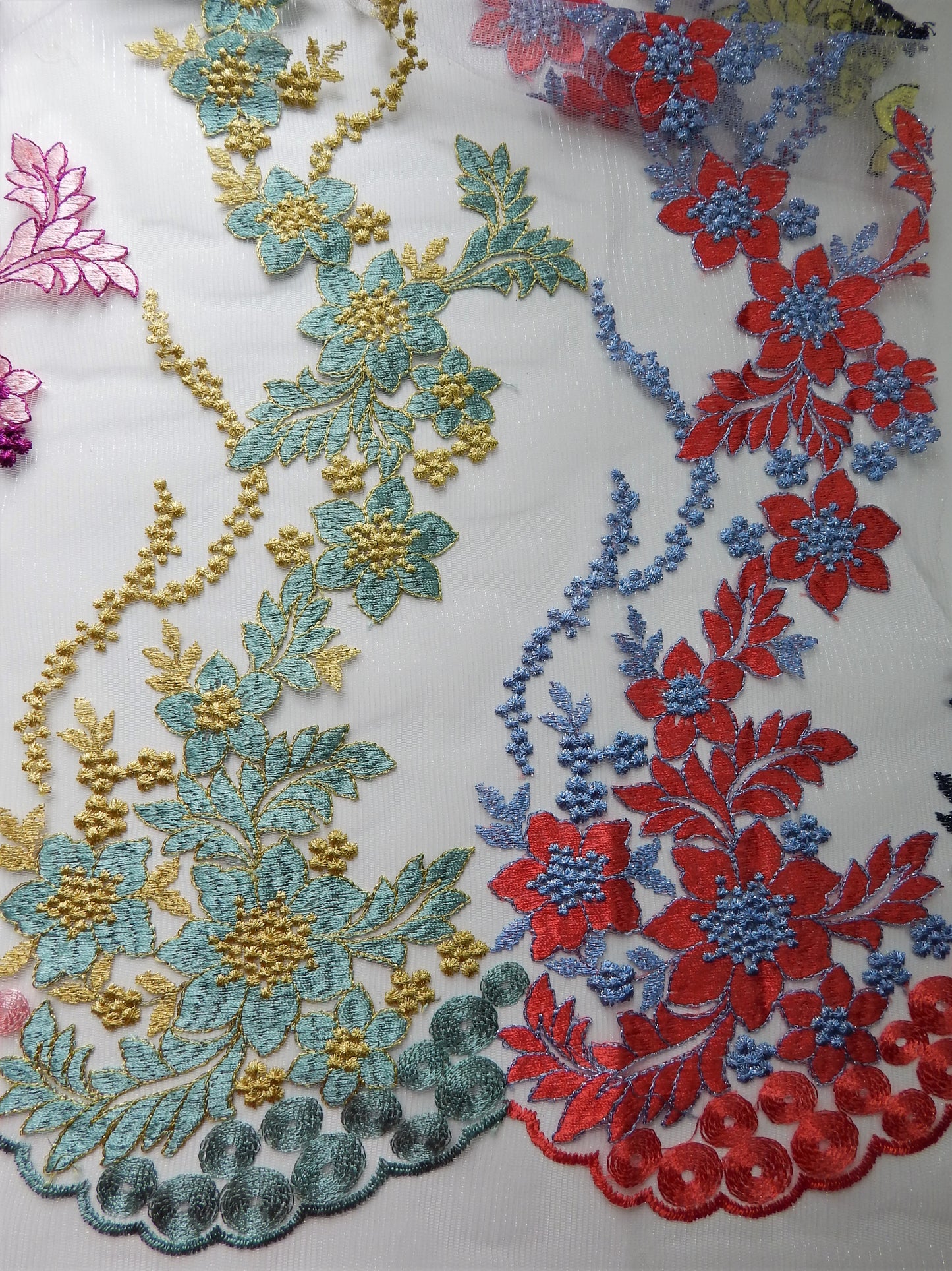 Blue and red lace fabric