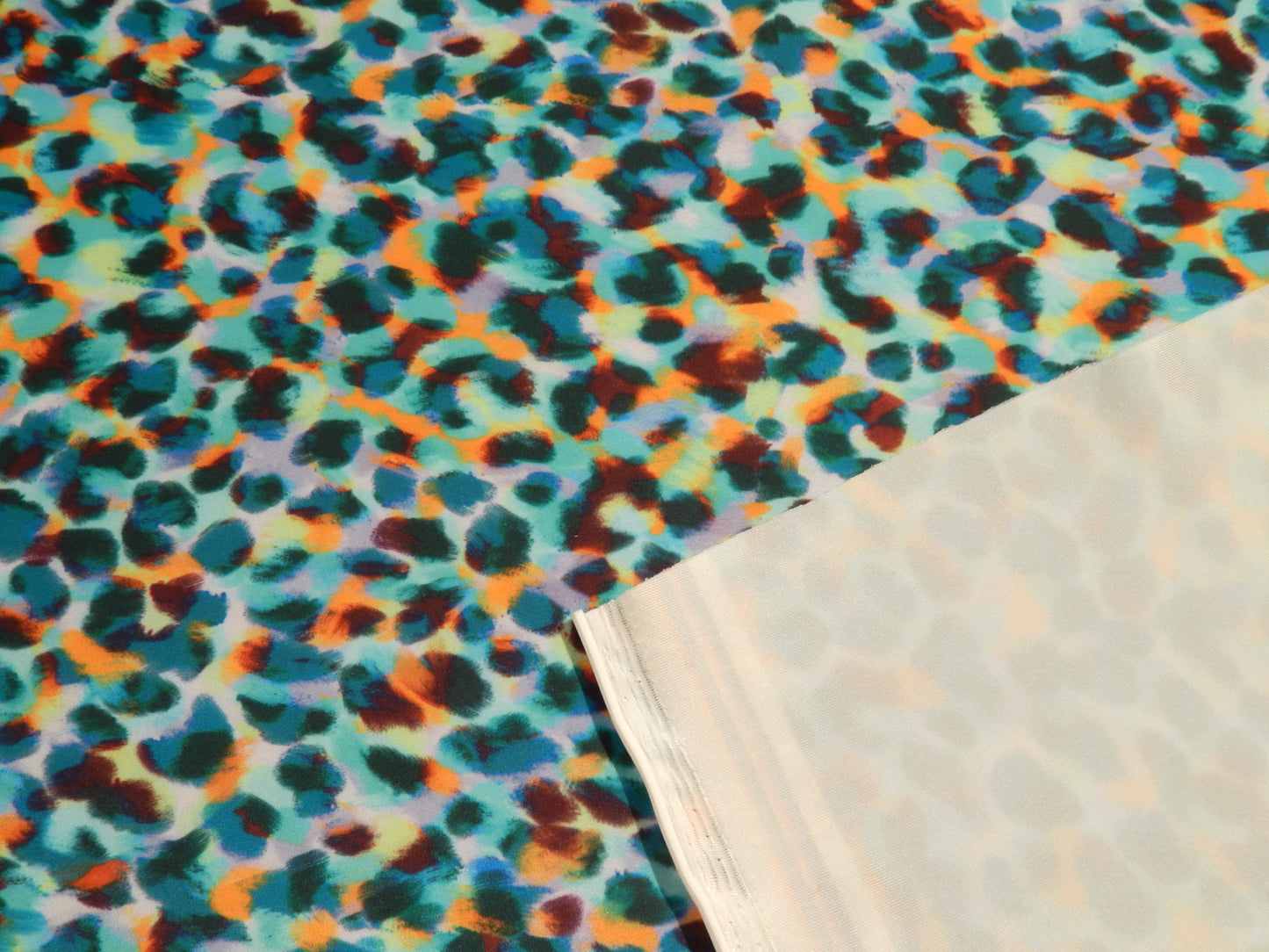 Blue and Orange Cheetah Print Swim Knit - Telio
