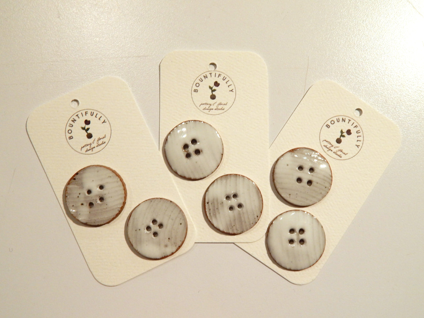 Hand Made Flat White Ceramic Buttons - by Bountifully