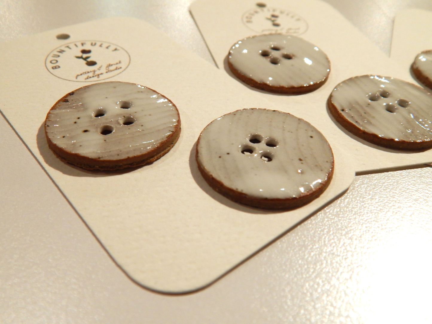 Hand Made Flat White Ceramic Buttons - by Bountifully