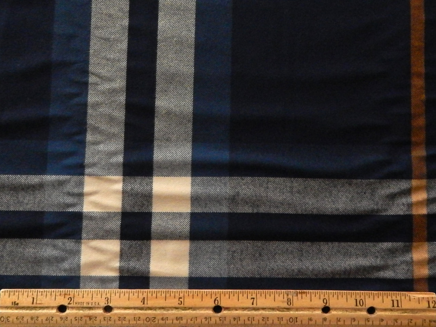 blue, white, and gold striped fabric