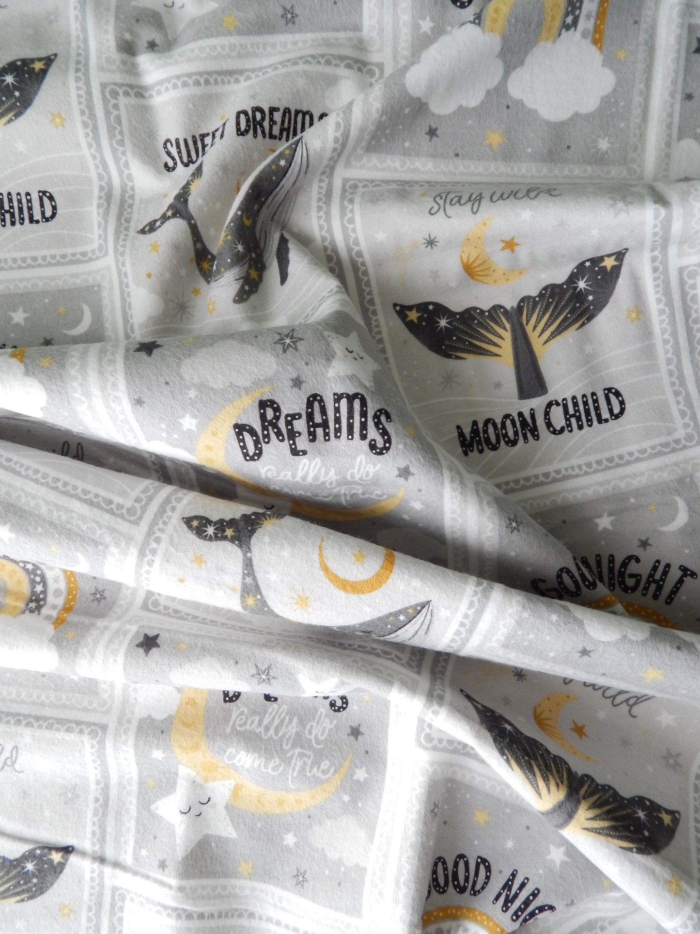 whales and moons childrens flannel fabric