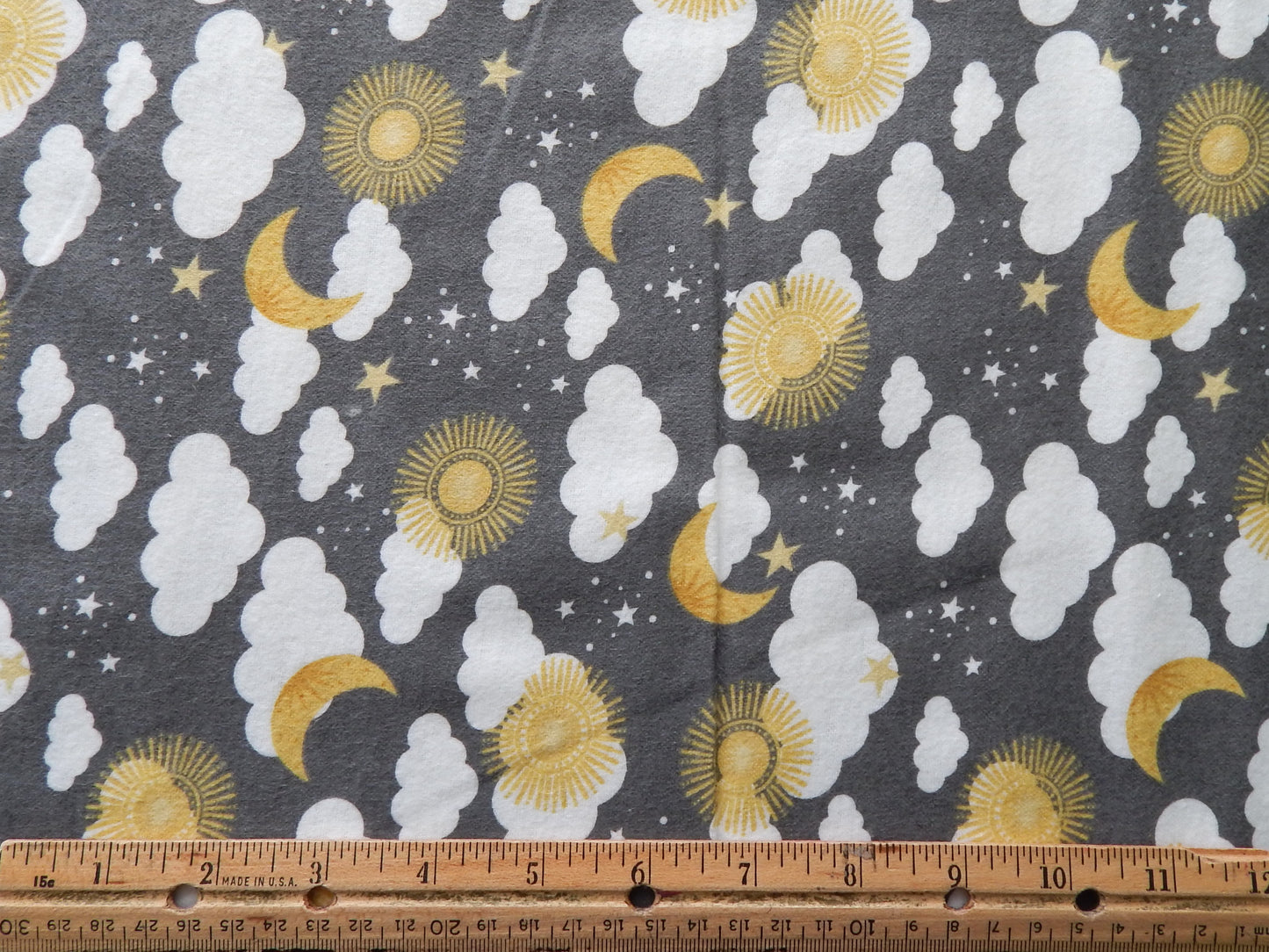 clouds, moons, and suns baby fabric
