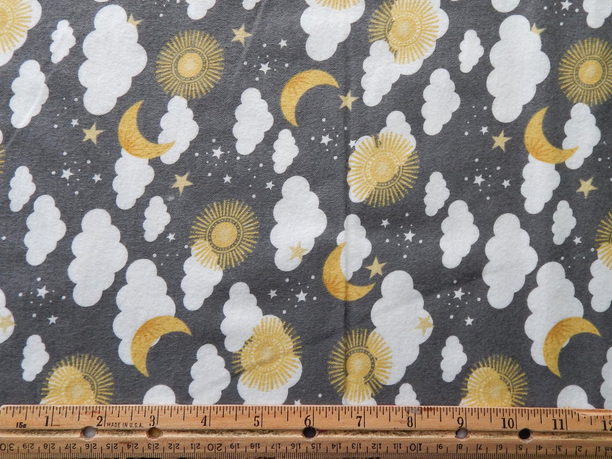 clouds, moons, and suns baby fabric