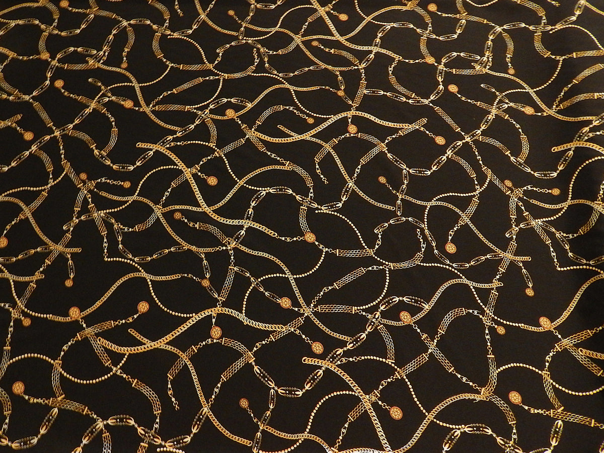 designer versace style chains print on black and gold stretch satin deadstock fabric