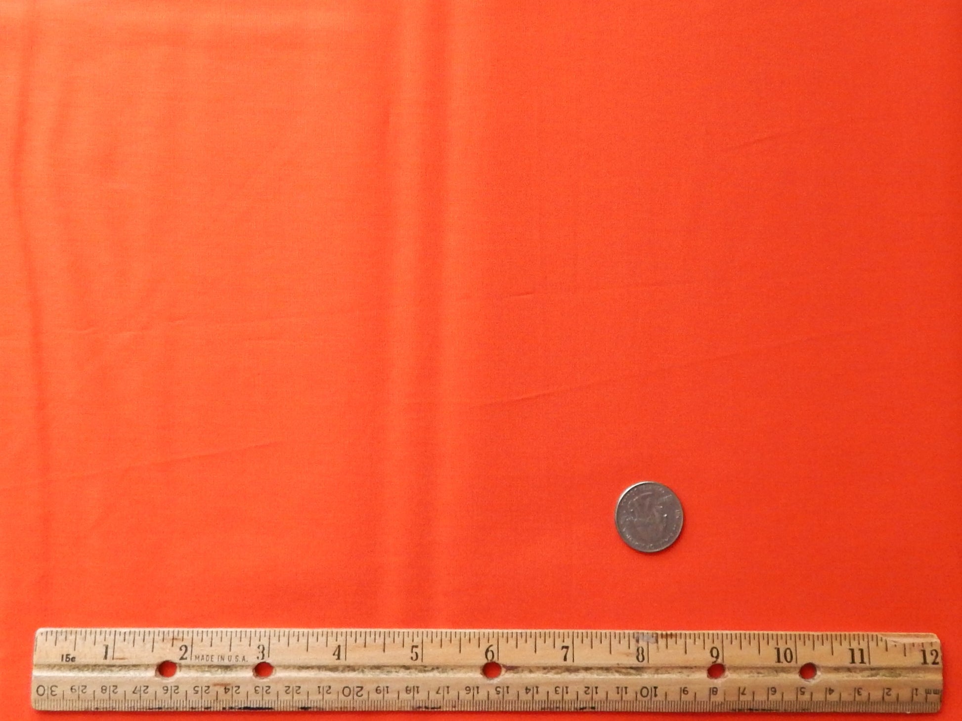 solid bright orange cotton fabric