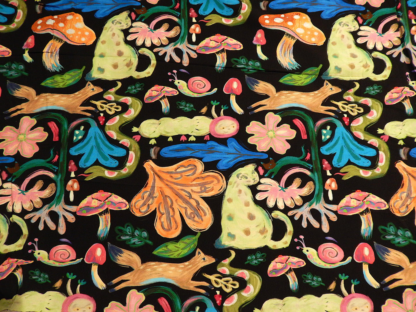 psychedelic oil pastel cat fox mushroom snake folk style green pink yellow blue and black rayon challis telio fabric