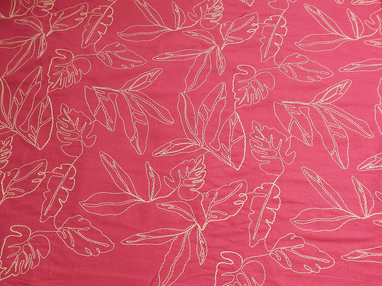 hot pink and natural monstera leaf couched linen and rayon blend telio fabric