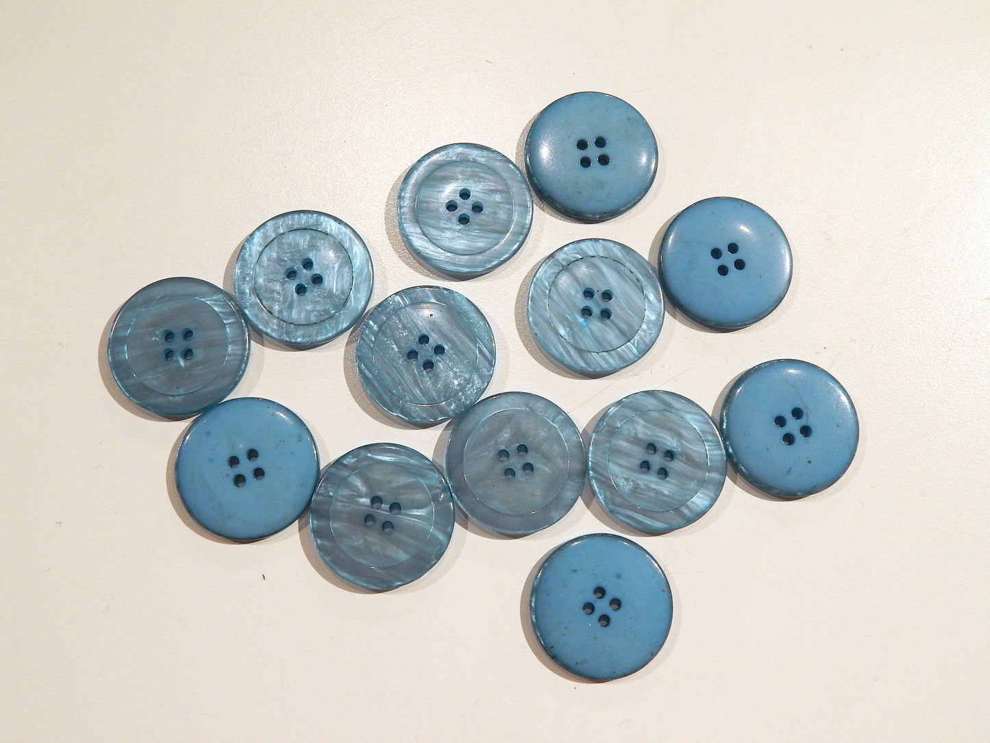 light blue pearly large 4 hole coating buttons with rim