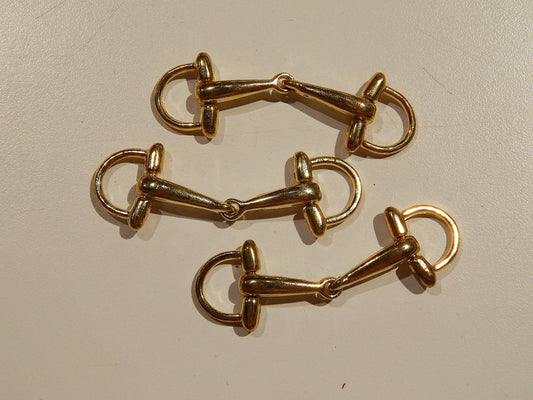 gold metal cloak and coat buckles military style