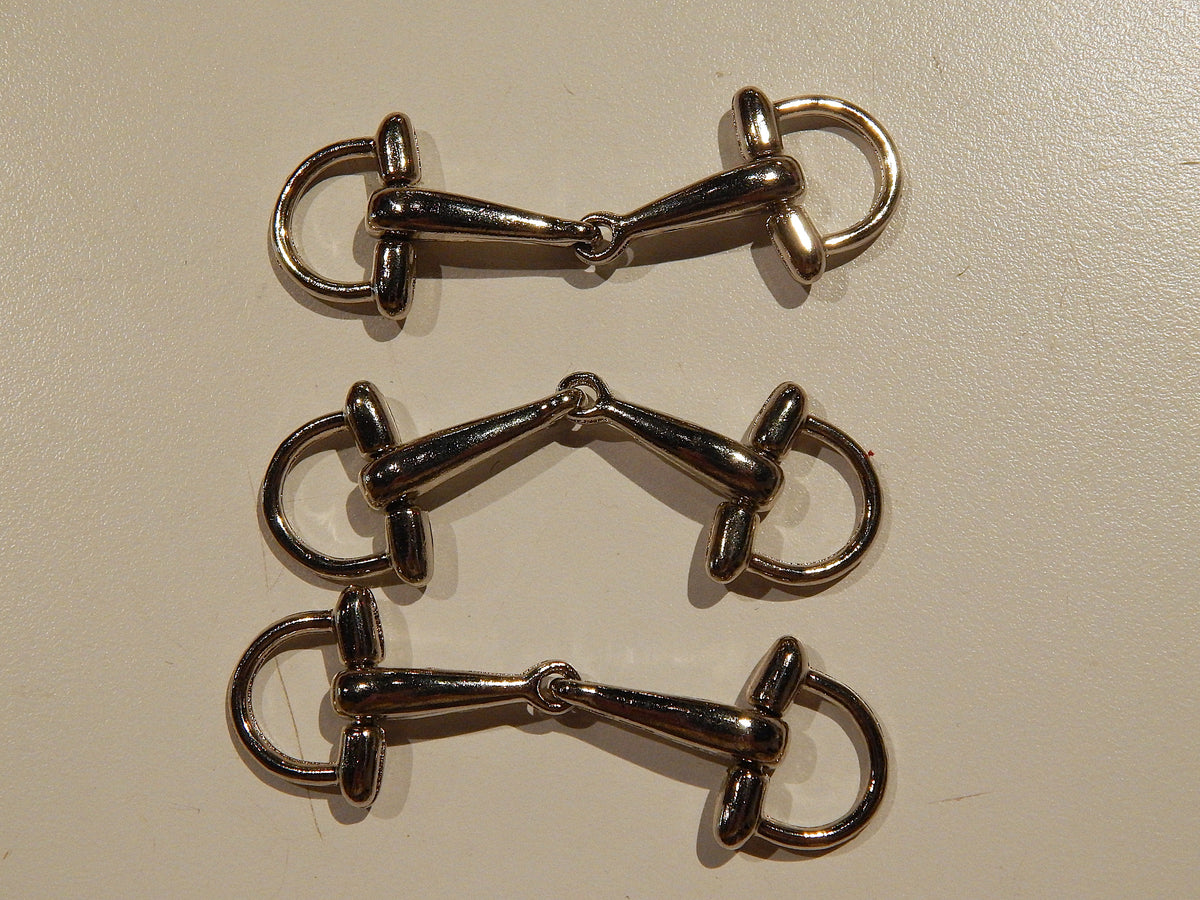 silver metal cloak coating buckles