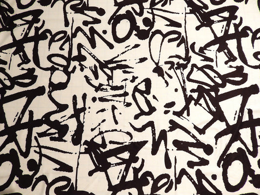 black and white graffiti scribbles polyester spandex jersey knit telio fabric