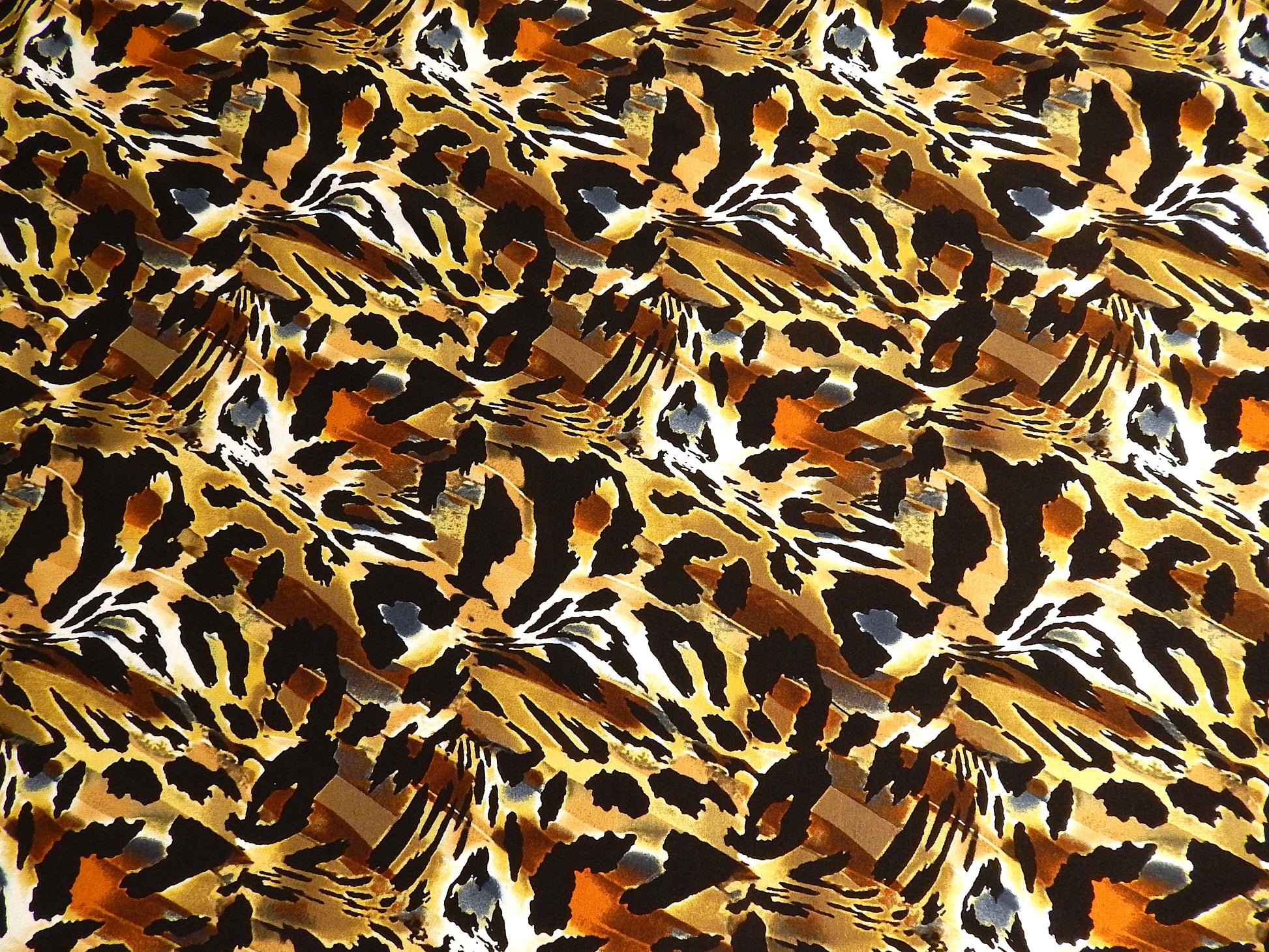 mustard black red blue white cheetah abstract print rayon jersey telio fabric versace