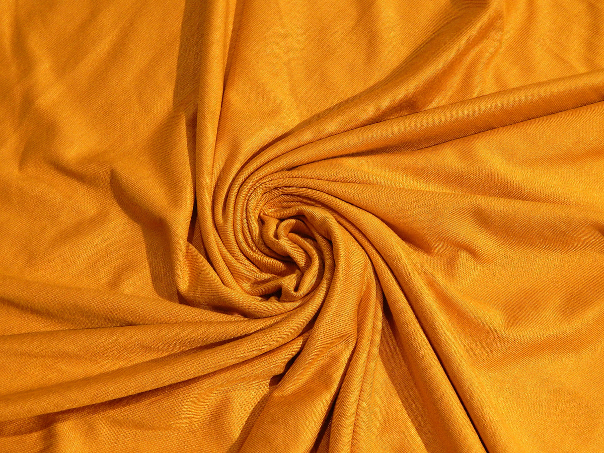 goldenrod yellow gold rayon jersey knit deadstock fabric