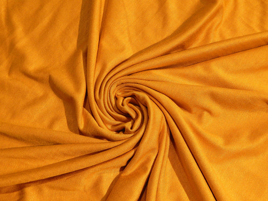goldenrod yellow gold rayon jersey knit deadstock fabric