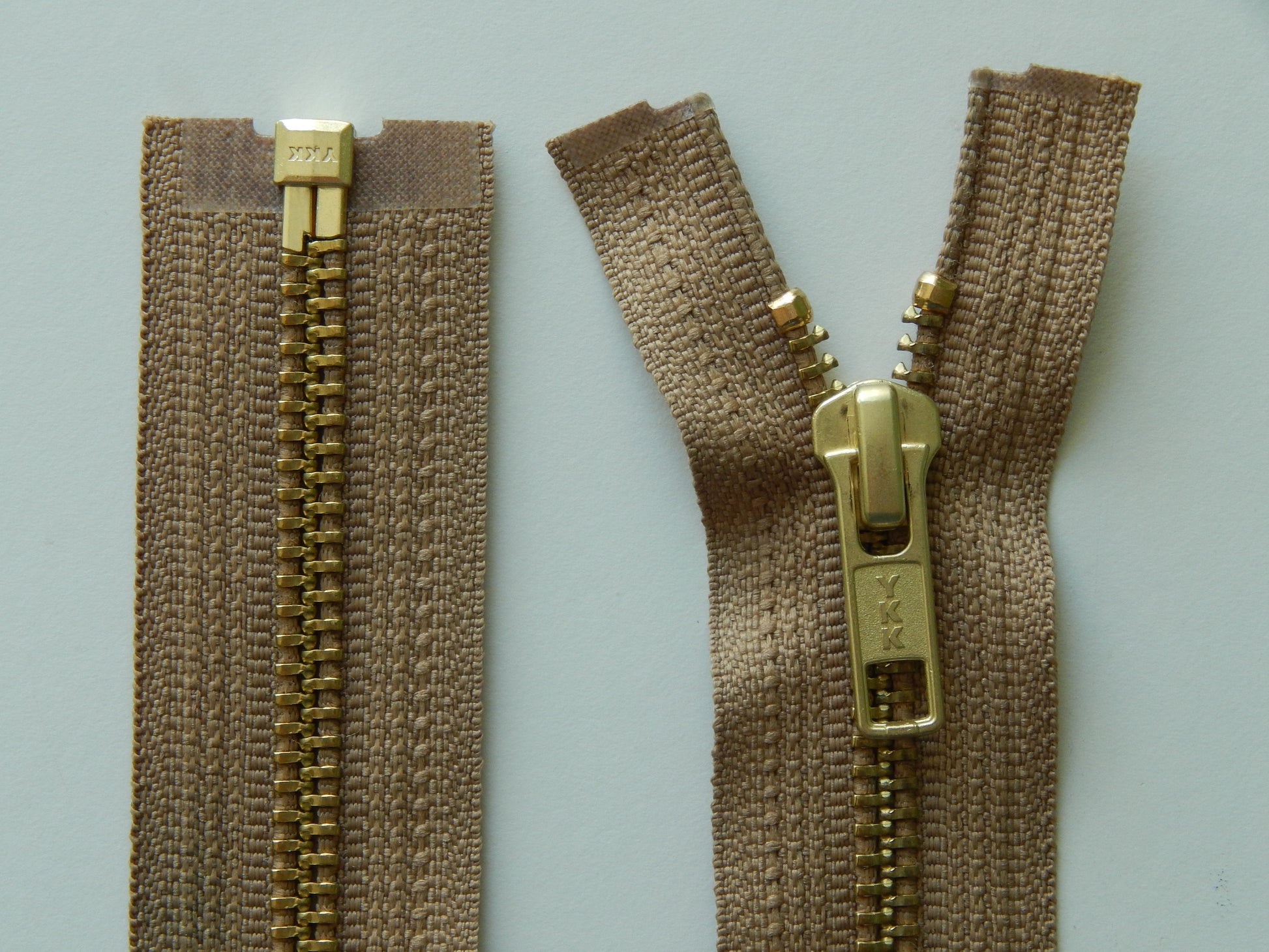 buff and brass jacket zipper