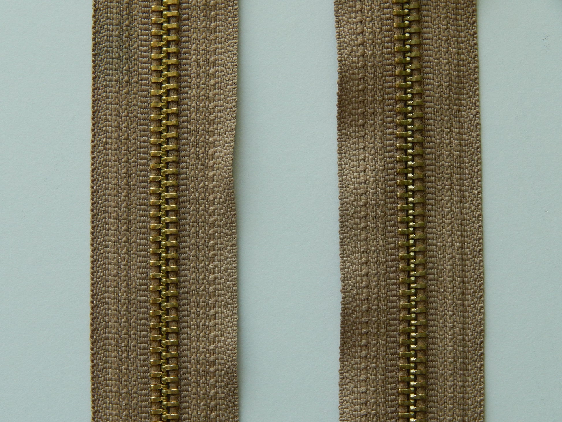 tan and gold zippers