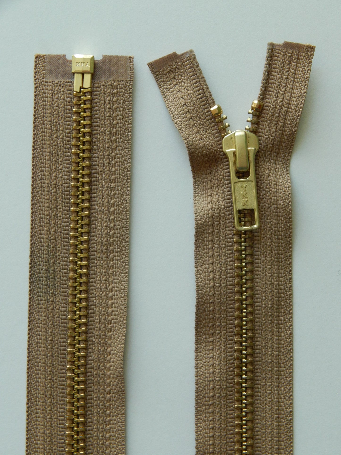 khaki brown and brass gold separating jacket zippers