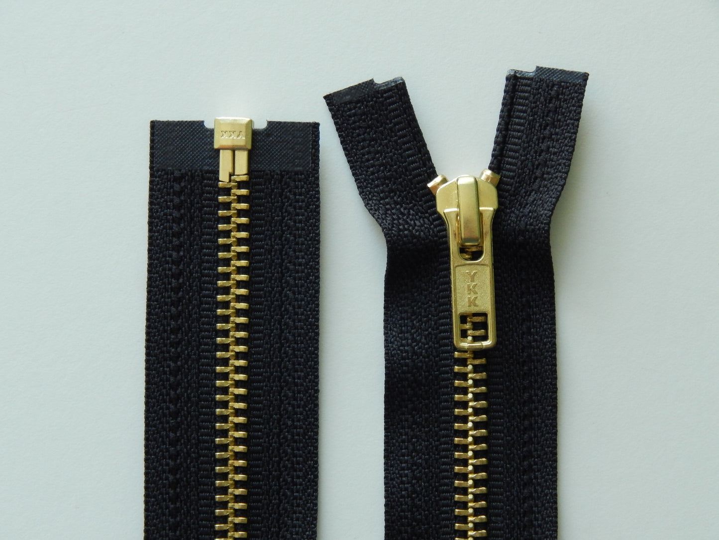 black and brass jacket zippers