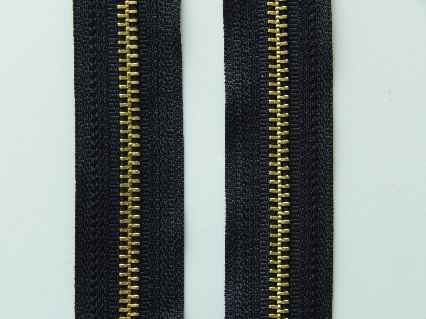 black and gold zipper