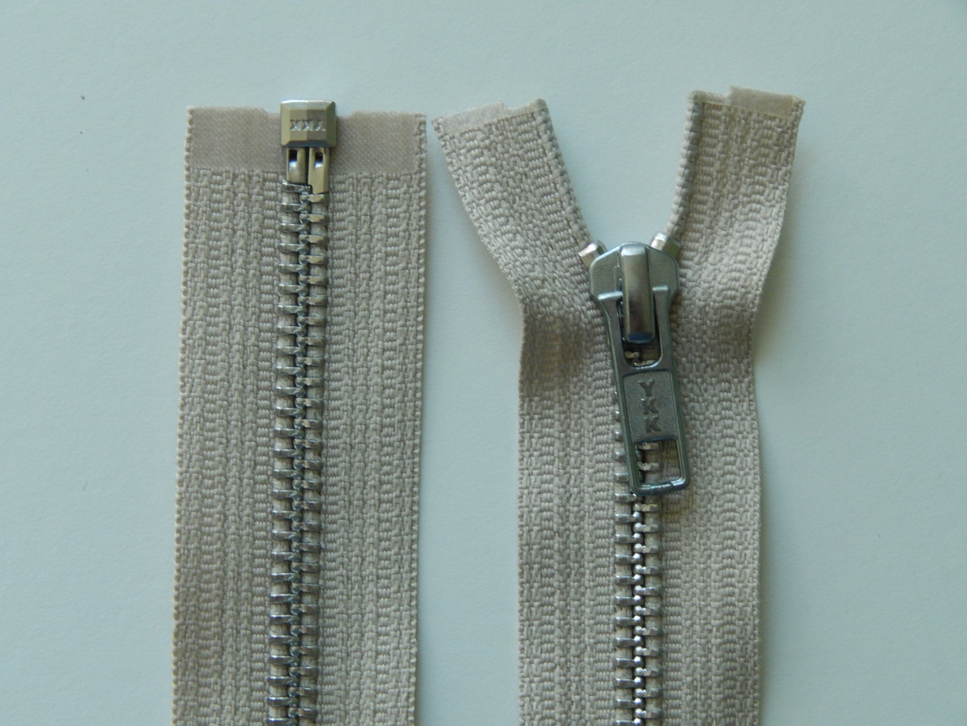 tan and silver jacket zipper