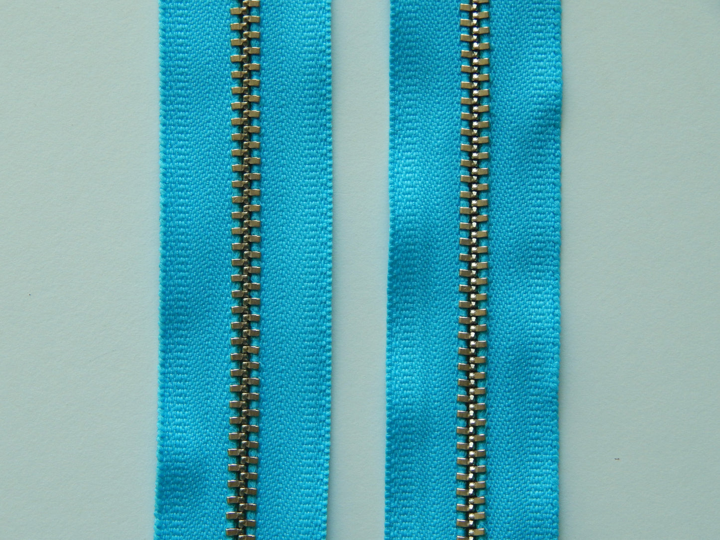 bright blue and nickel zipper
