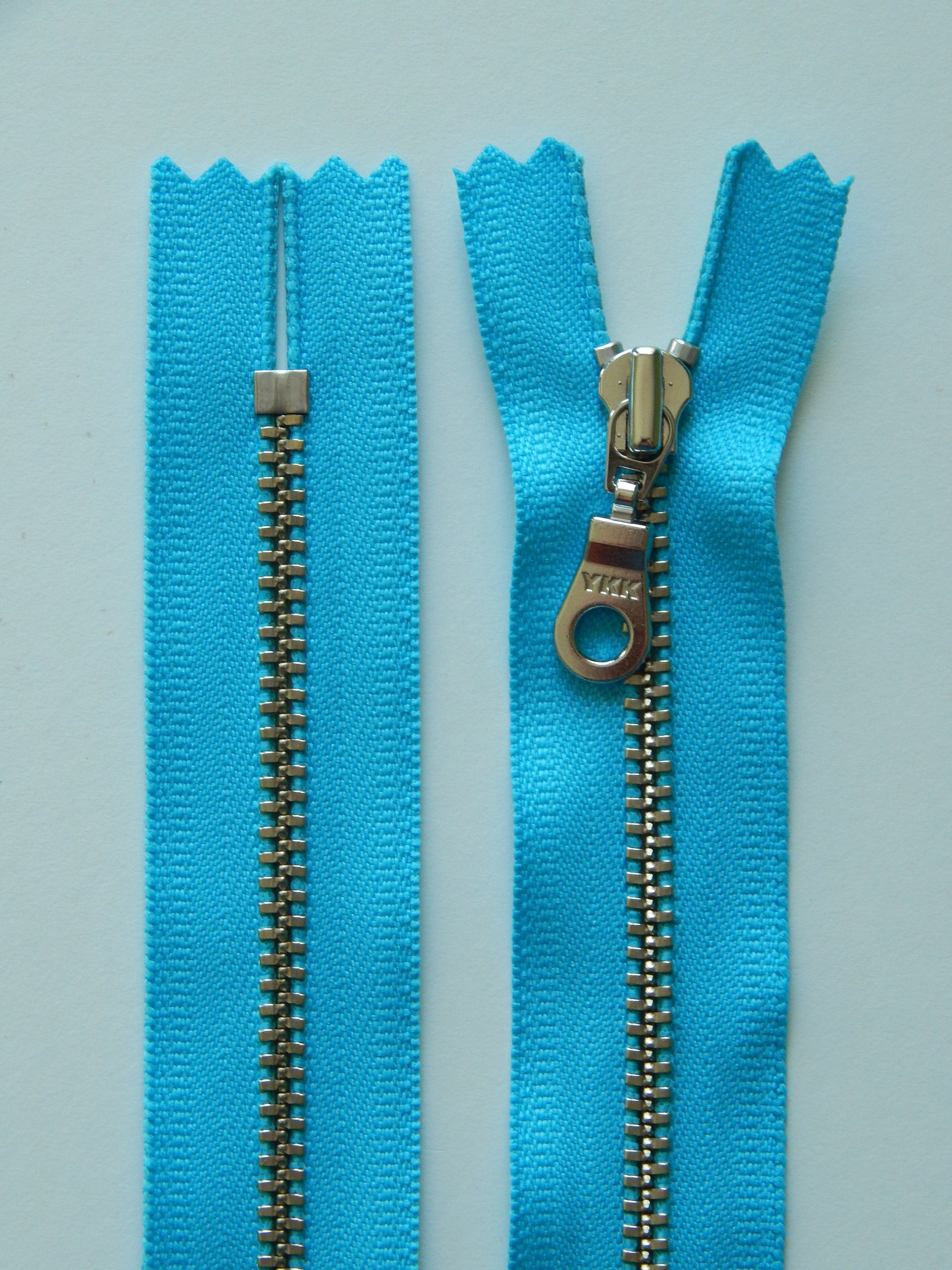 electric blue and silver nonseparating zipper